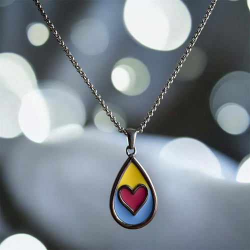 Beside Me Always Comfort Pendant. An autism-friendly pendant designed with calming colours.