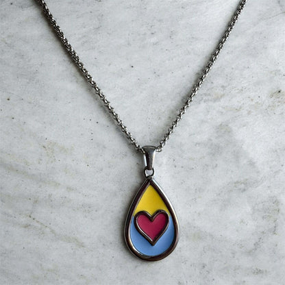 Beside Me Always Comfort Pendant. An autism-friendly pendant designed with calming colours.
