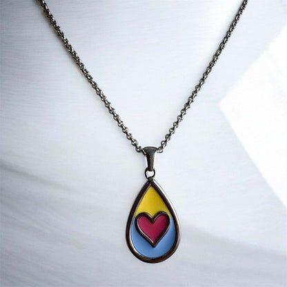 Beside Me Always Comfort Pendant. An autism-friendly pendant designed with calming colours.