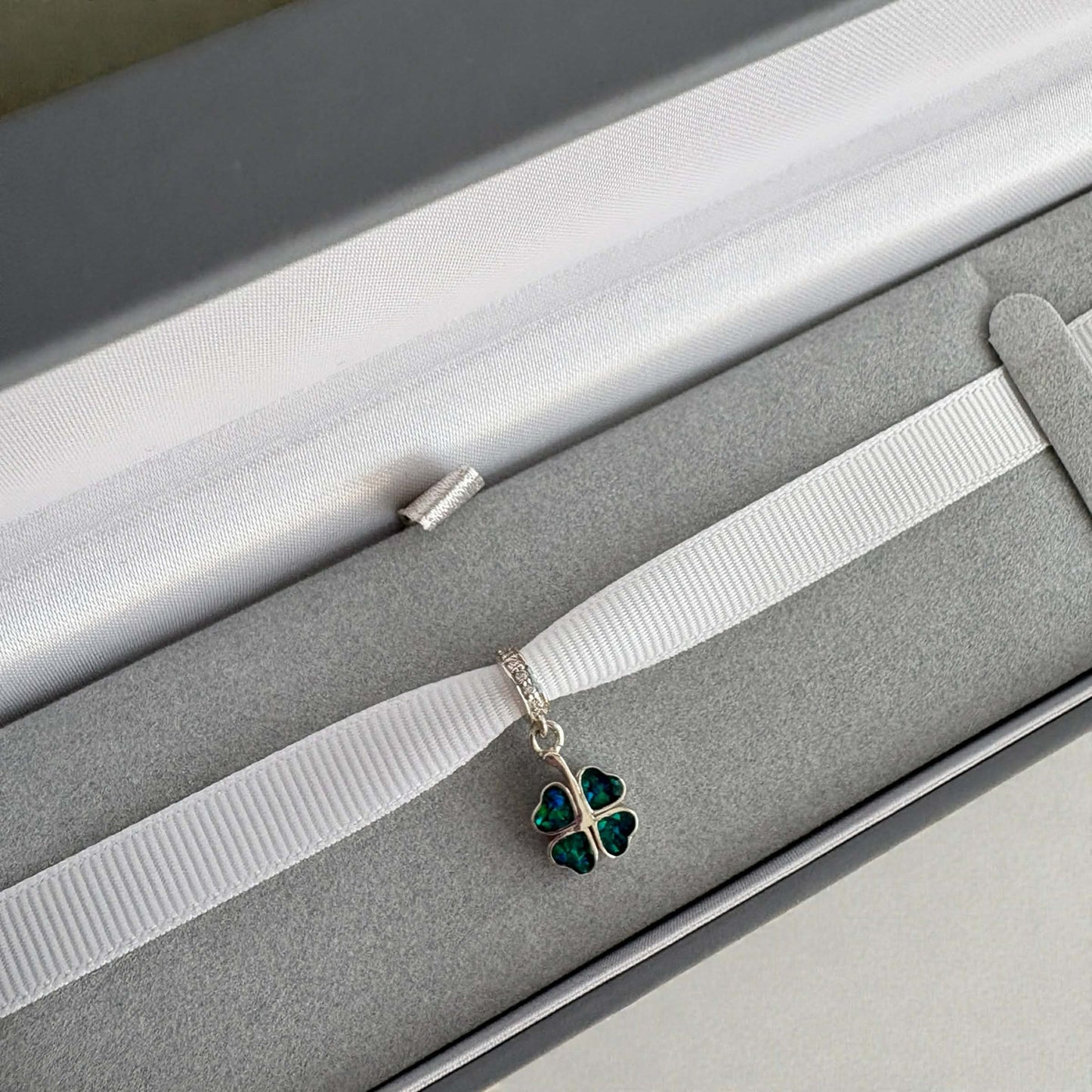 Dangling Clover Charm