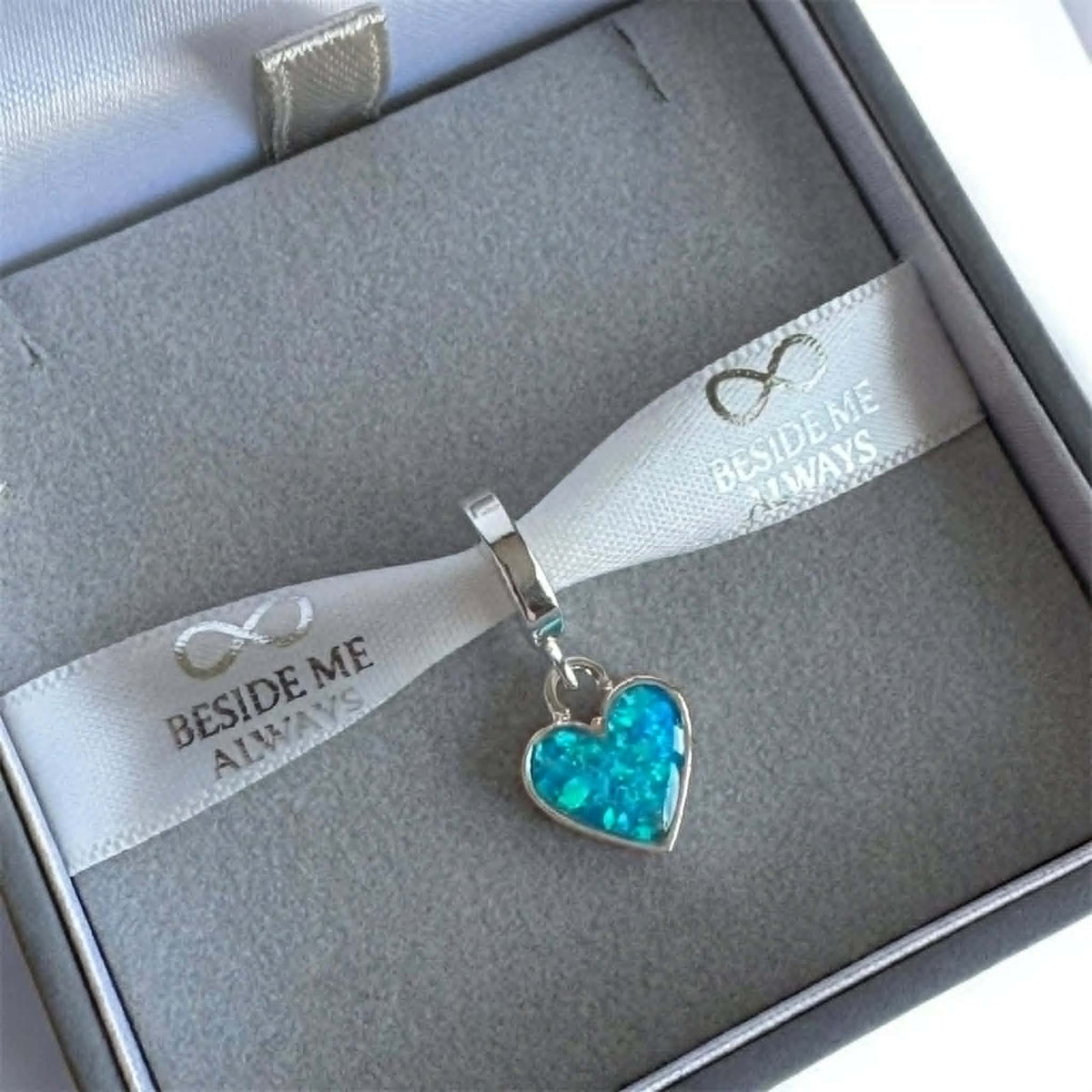 Dangling Heart Charm.