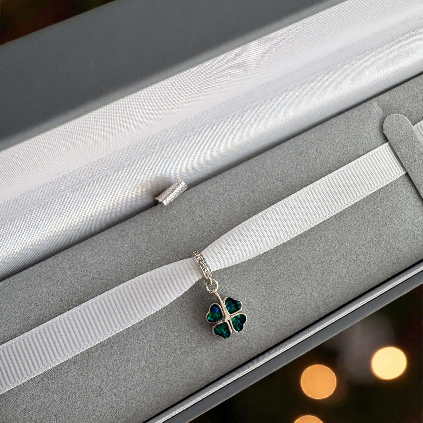 Dangling Clover Charm