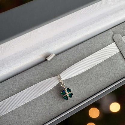 Dangling Clover Charm